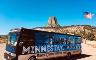 Minnestay RV in front of Devil's Tower.