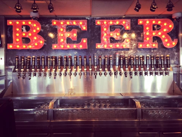 Thirty Surly Beer Taps. Text: Beer.