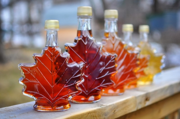 Maple syrup in leaf-shaped bottles.
