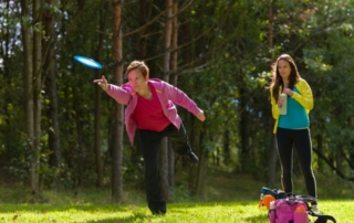 Person throwing a frisbee.