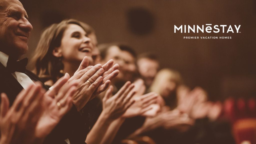 People clapping in one of the historical theatres in Downtown Minneapolis Minnesota