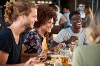 Group of Friends at Restaurant in the Market at Malcolm Yard