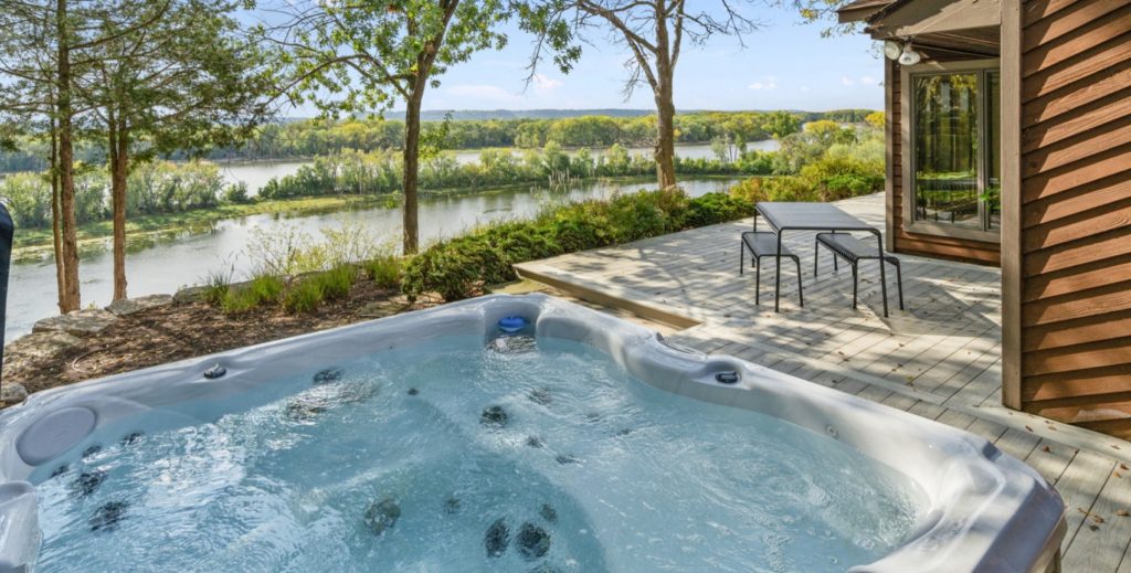 The Riverfront Inn Jacuzzi overlooking the river making a very romantic view.